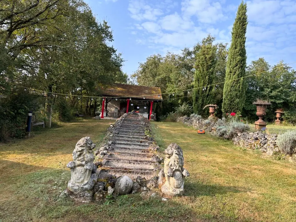 Forge in France - zen waterfall outdoor kitchen
