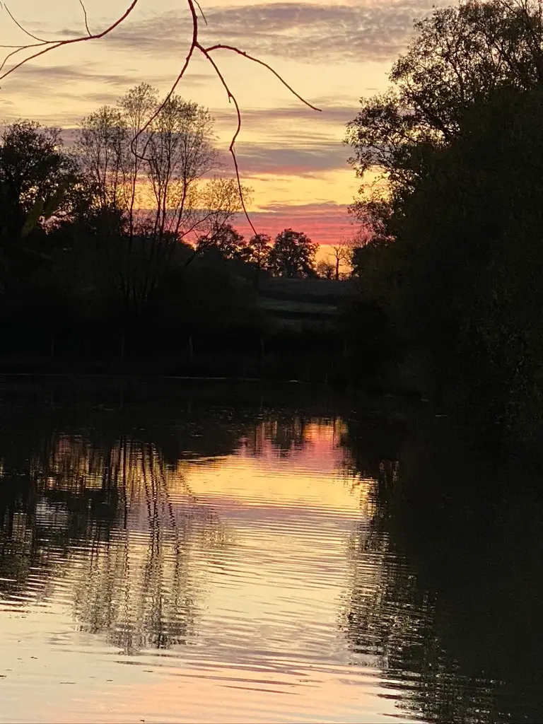 Forge in France - sunset over lake