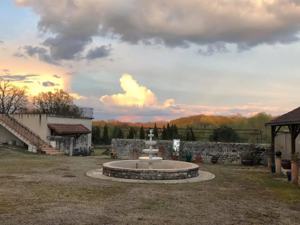 Forge in France courtyard red sky